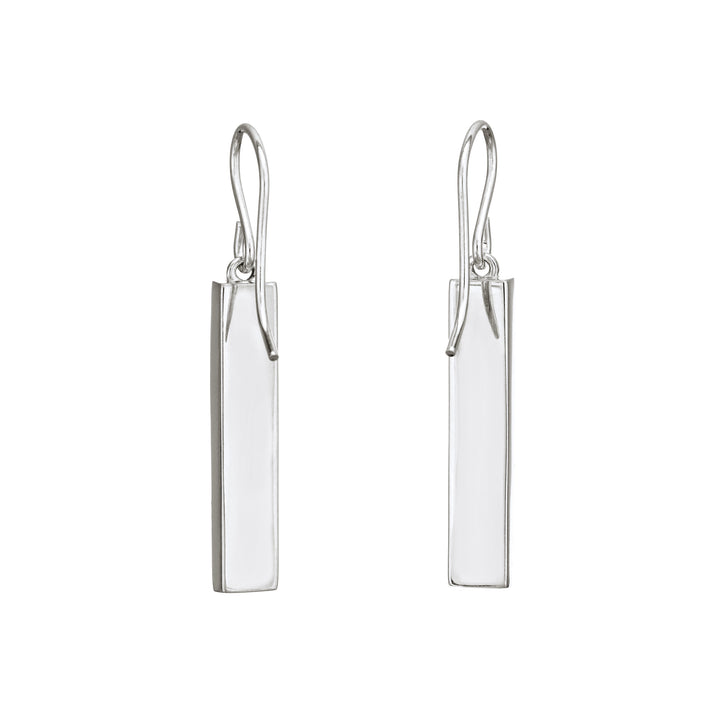 cremation earrings with sterling silver bar settings by close by me from behind against a white background
