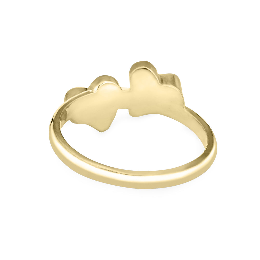 Back view of Close By Me's 14K Yellow Gold Double Heart Cremation Ring, floating against a white backdrop.