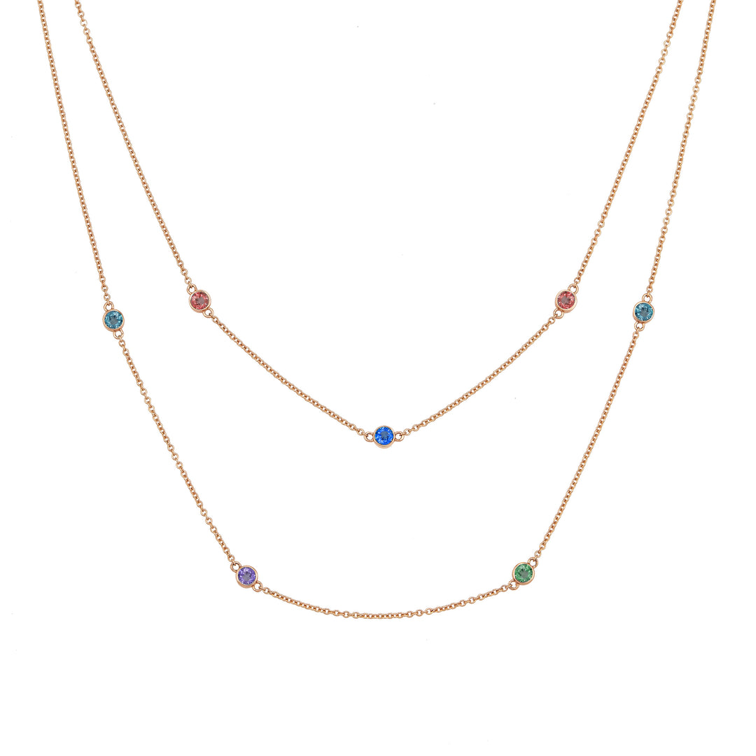 Front of Close By Me's Double Strand Birthstone Necklace in 14K Rose Gold, set with 7 different gemstones.