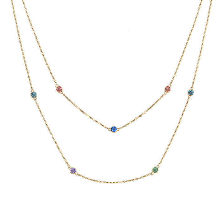 Front of Close By Me's Double Strand Birthstone Necklace in 14K Yellow Gold, set with 7 different gemstones.