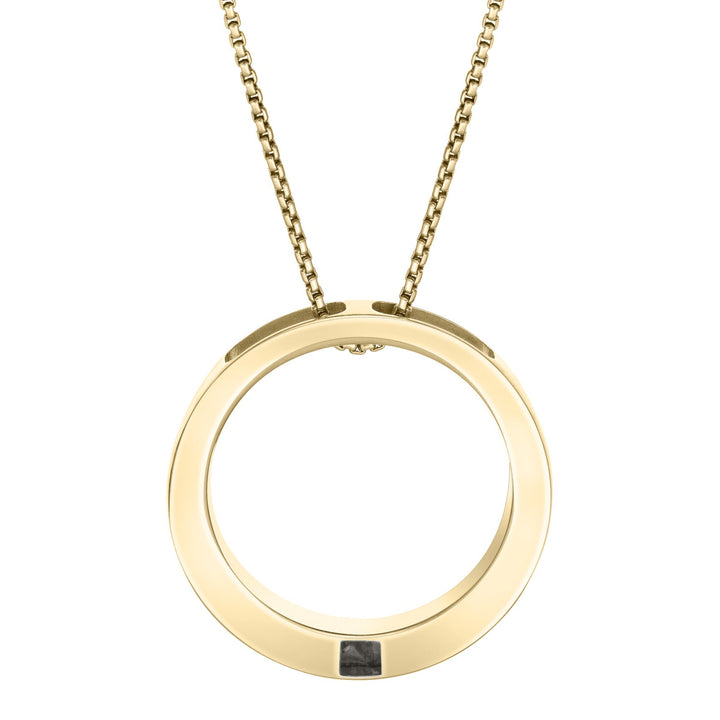 close by me's large open circle cremation pendant in 14k yellow gold hanging on a chain against a white background