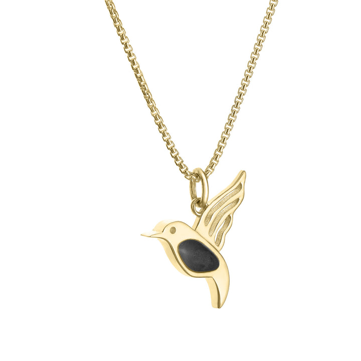 Close-up, side view of Close By Me's Hummingbird Cremation Necklace in 14K Yellow Gold against a solid white background.