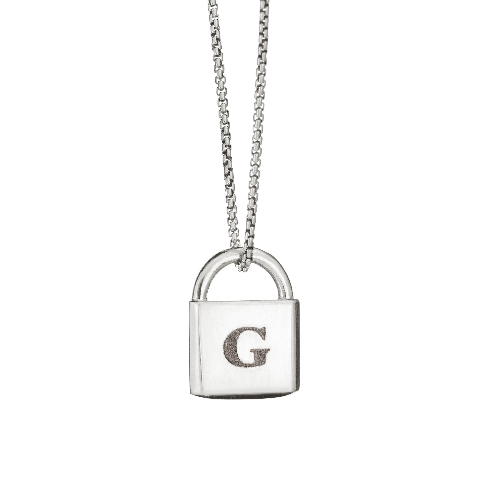 Close up of Louis Vuitton Lockit pendant in sterling silver
