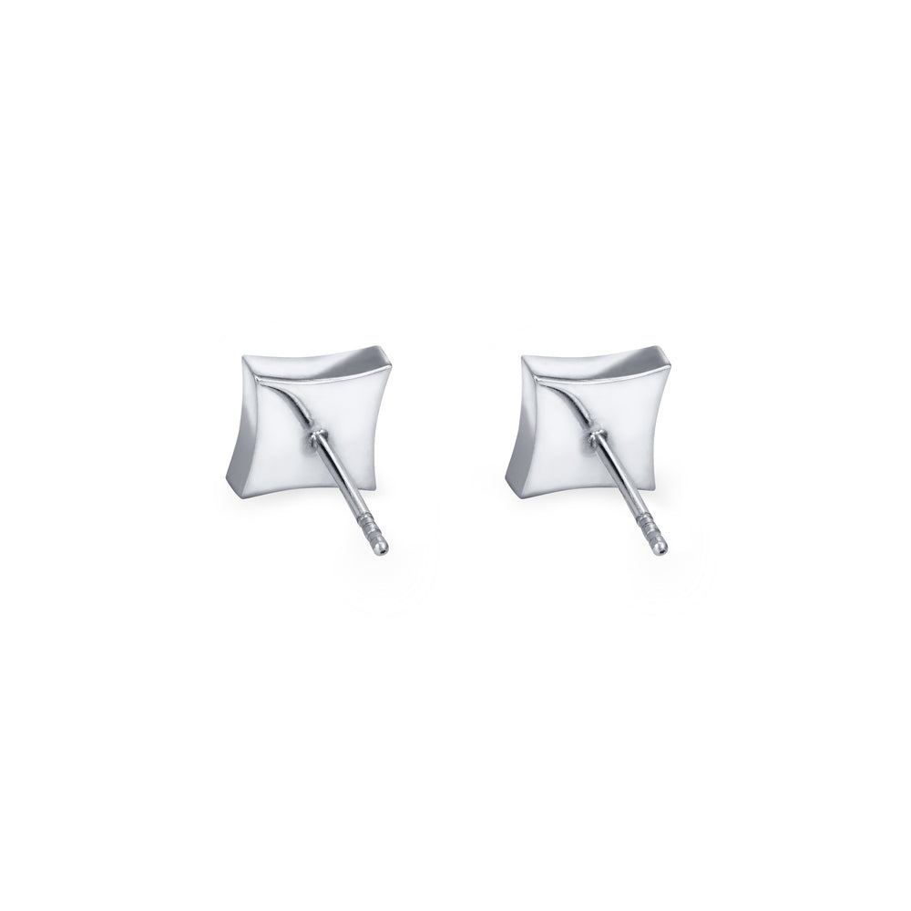 A back view of a pair of Close By Me's Luminary Stud Cremation Earrings in 14K White Gold set against a solid white background.