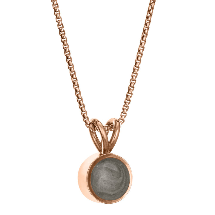 This photo shows the Rabbit Ear Ashes Pendant in 14K Rose Gold by close by me jewelry from the side
