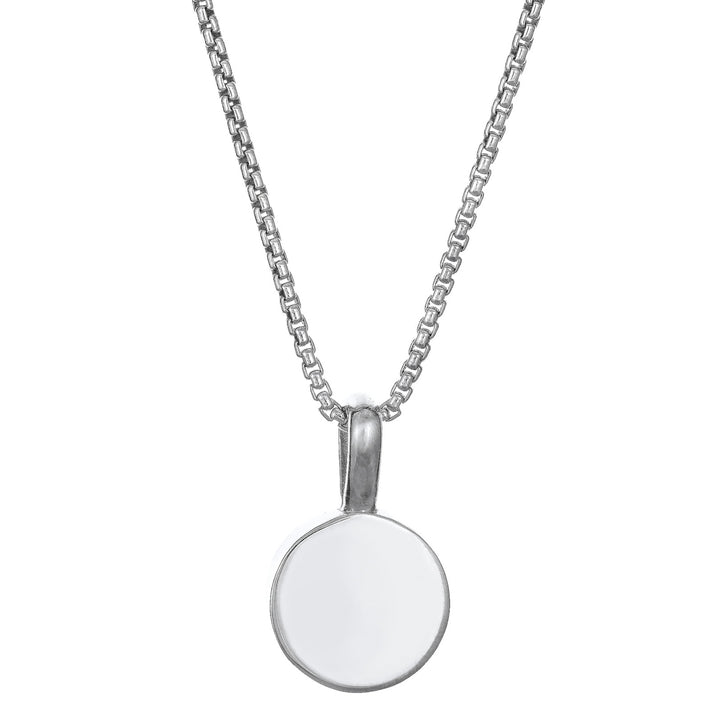 The 14K White Gold Single Setting Circle Cremains Pendant designed and set with cremains by close by me jewelry from the back