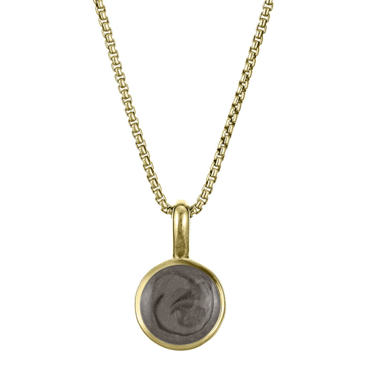 The 14K Yellow Gold Single Setting Circle Ashes Pendant designed and set with cremains by close by me jewelry from the front