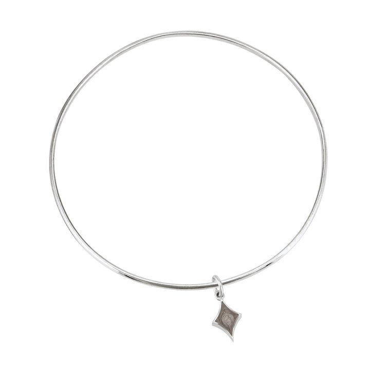 Sterling silver single bangle cremation bracelet with diamond ashes charm shown from the top