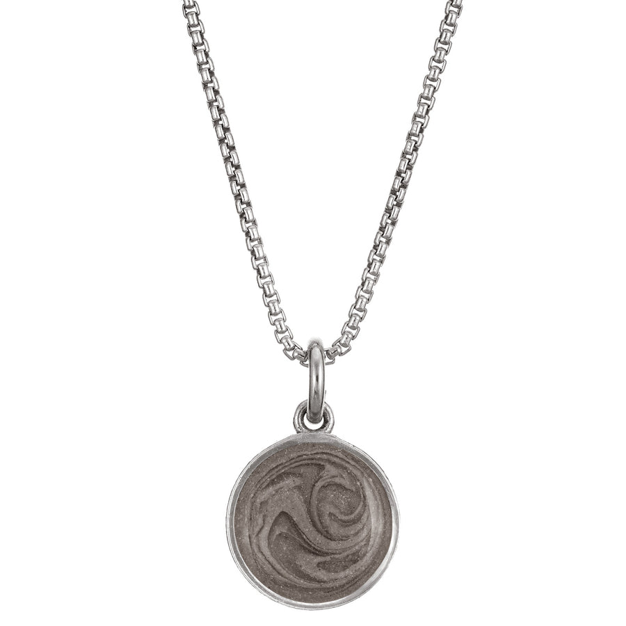 Pictured here is the 10mm Dome Pendant with ashes, designed by close by me jewelry in Sterling Silver, from the front