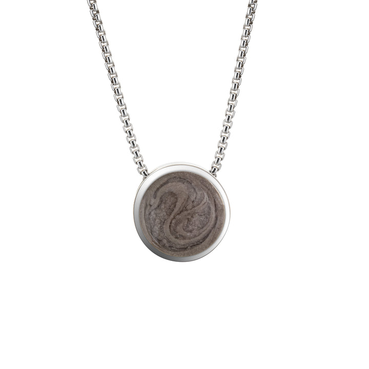 This photo shows the Sterling Silver 8mm Sliding Solitaire Pendant with Cremated Remains designed by close by me jewelry from the front
