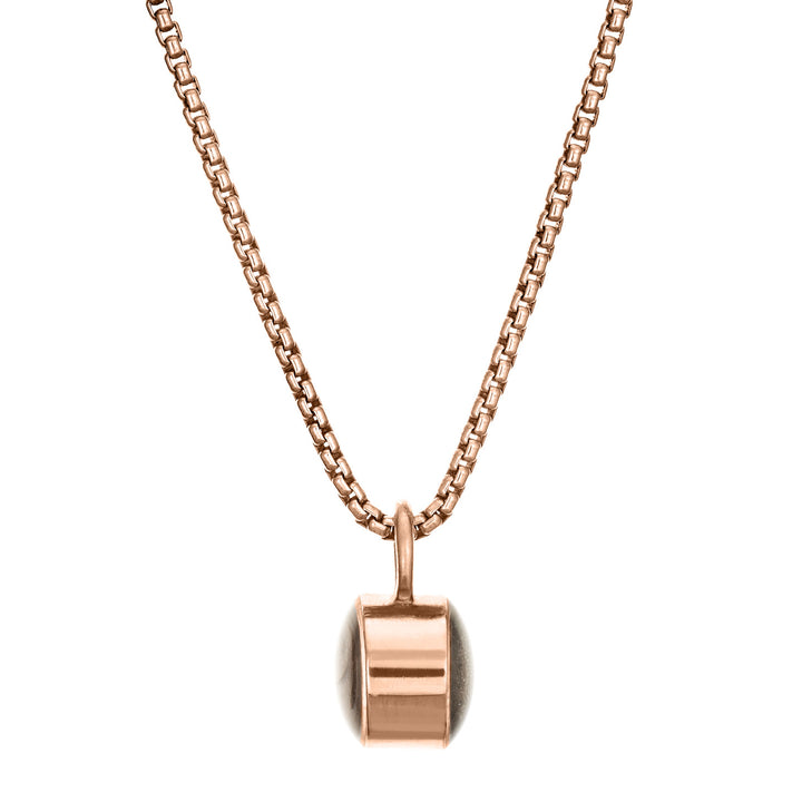 Pictured here is the Bilateral Cremation Necklace in 14K Rose Gold designed and set with ashes by close by me jewelry from the front