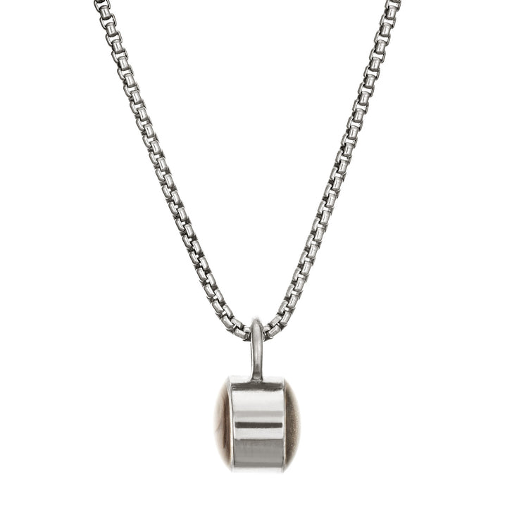 Pictured here is the Bilateral Cremation Necklace in Sterling Silver designed and set with ashes by close by me jewelry from the front