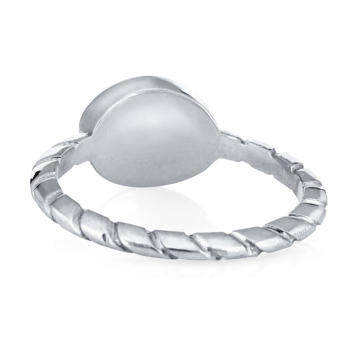 This pictured shows close by me jewelry's 14K White Gold Cable Band Ring from the back