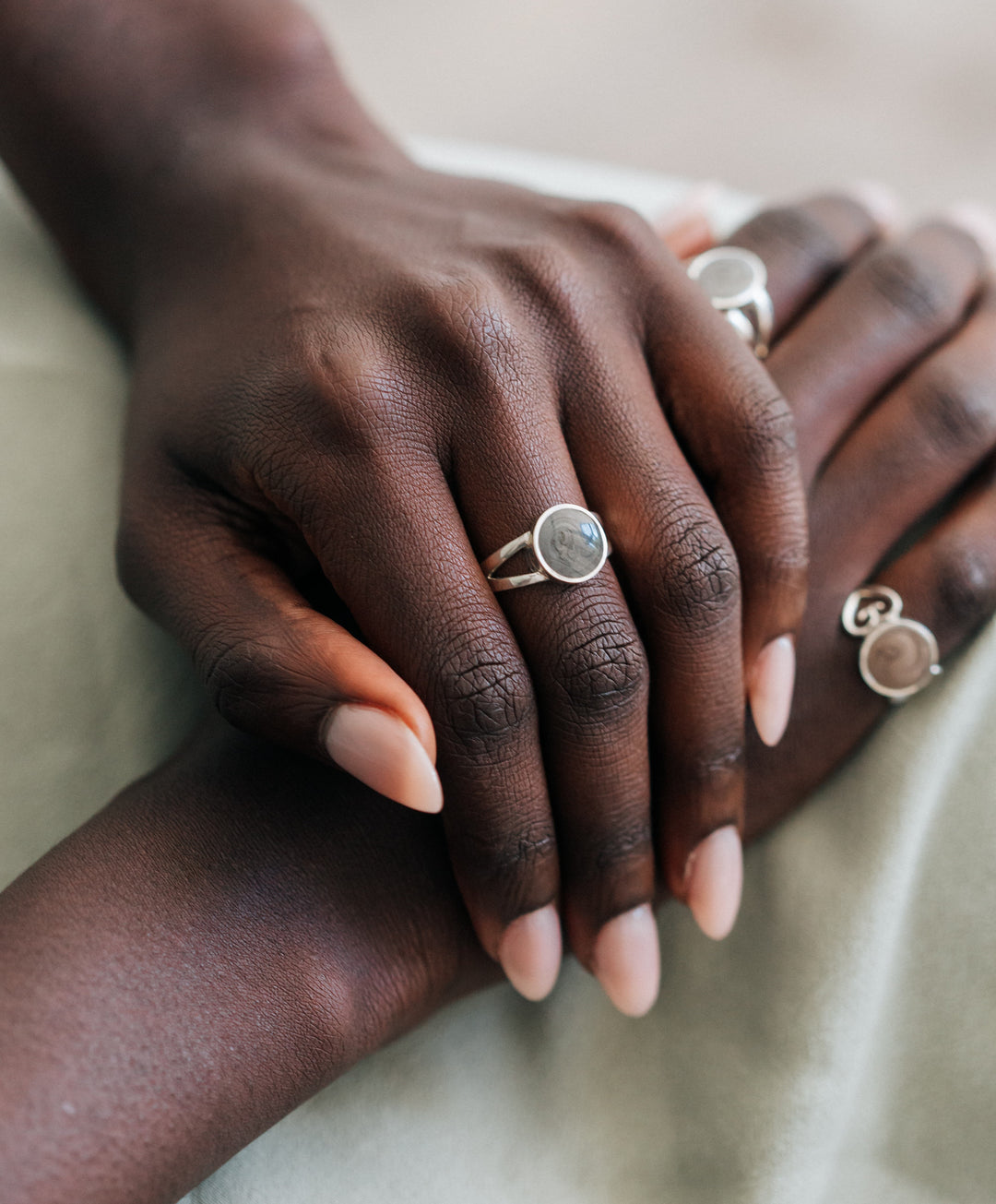 A photo of close by me's Circle Split Shank Ring in Sterling Silver being worn by a model