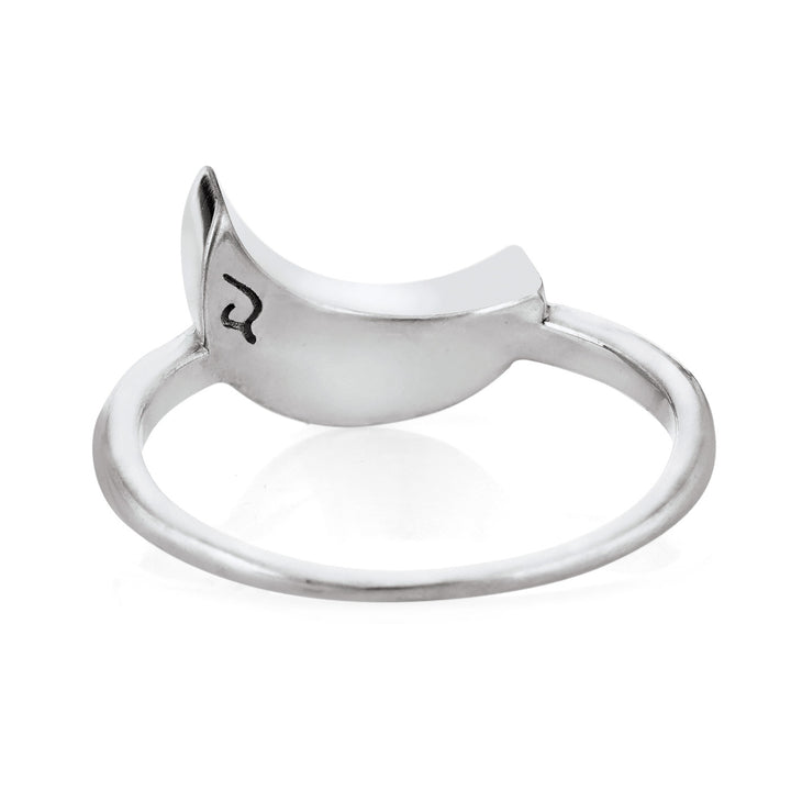 Pictured here is the Crescent Moon Ashes Ring design in 14K White Gold by close by me jewelry from the back to show the back of the setting and band detail