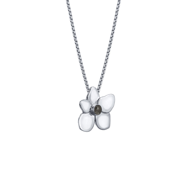 This is a photo showing close by me jewelry's Hydrangea Cremation Pendant in 14K White Gold from the side