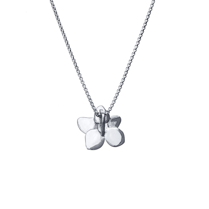 This is a photo showing close by me jewelry's Hydrangea Cremation Pendant in 14K White Gold from the back