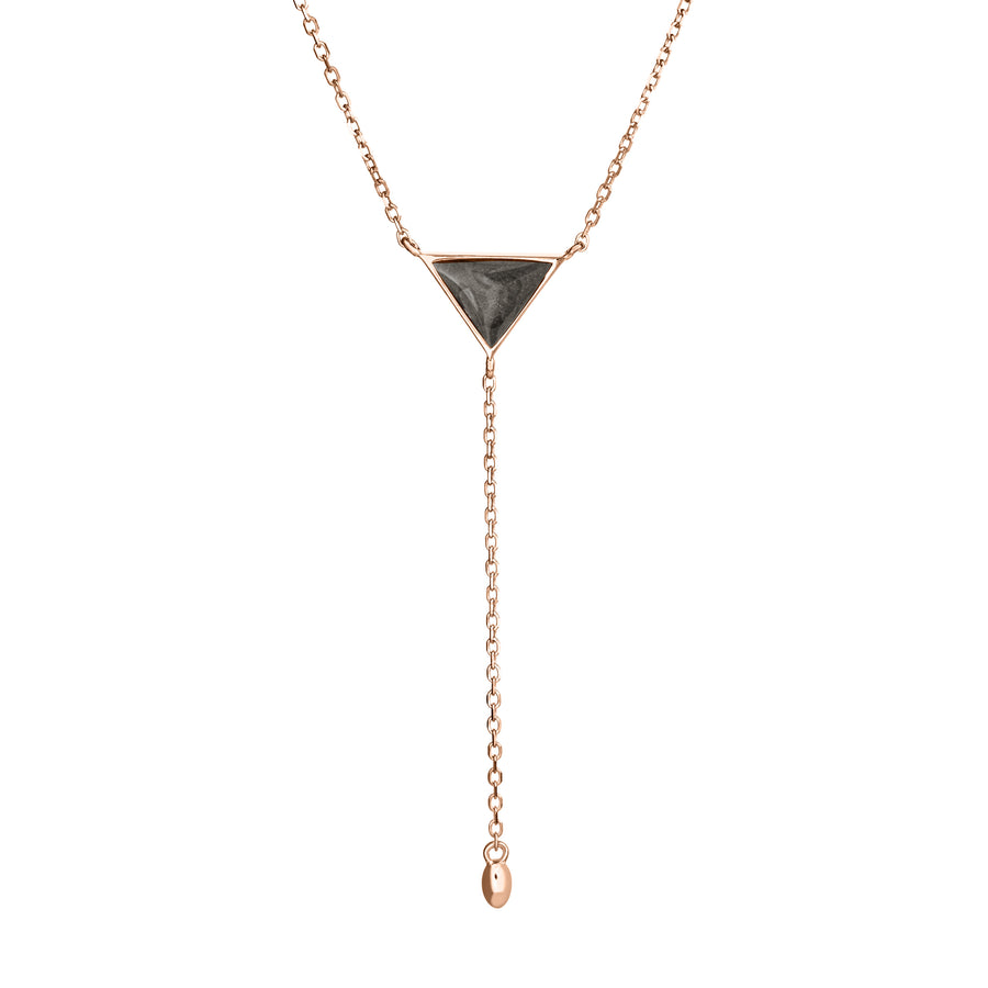 Pictured here is the Lariat Cremation Necklace design in 14K Rose Gold by close by me jewelry from the front to show its dark gray ashes setting and detailing