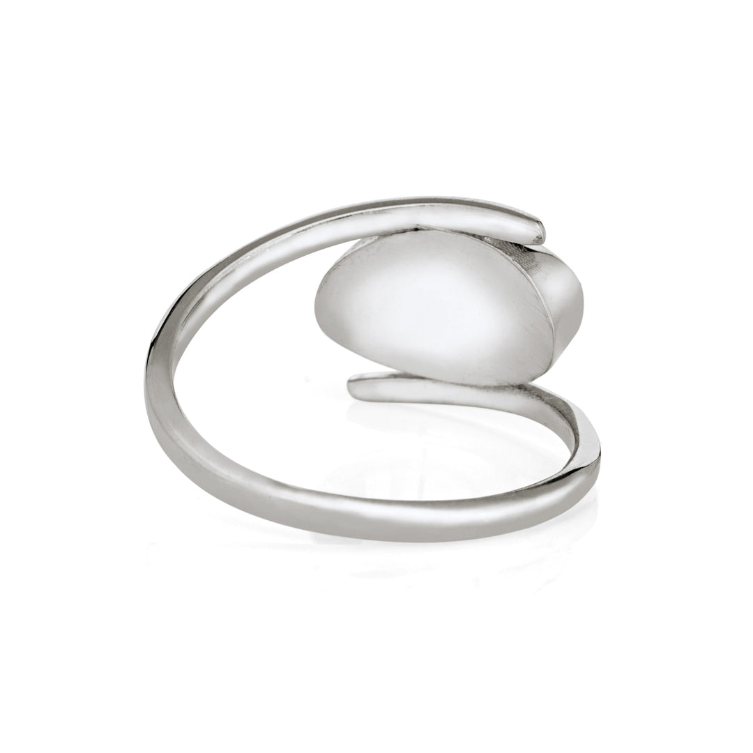 This photo shows the Oval Spiral Band Ashes Ring design in Sterling Silver by close by me jewelry from the back to show the band detail and back of the setting