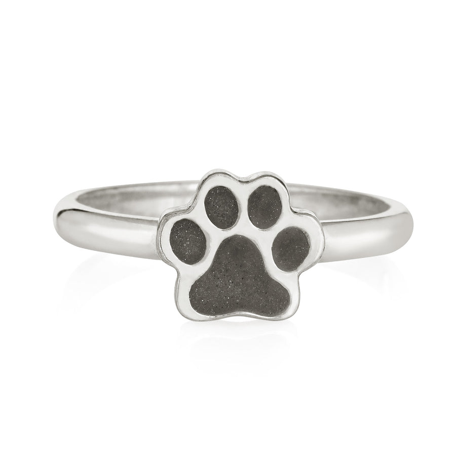 Pictured here is the Paw Print Stacking Cremation Ring in Sterling Silver by close by me jewelry from the front to show its grey ashes setting