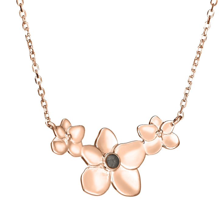 This photo shows the 14K Rose Gold Hydrangea Cluster Pendant with ashes designed by close by me jewelry from a slight angle