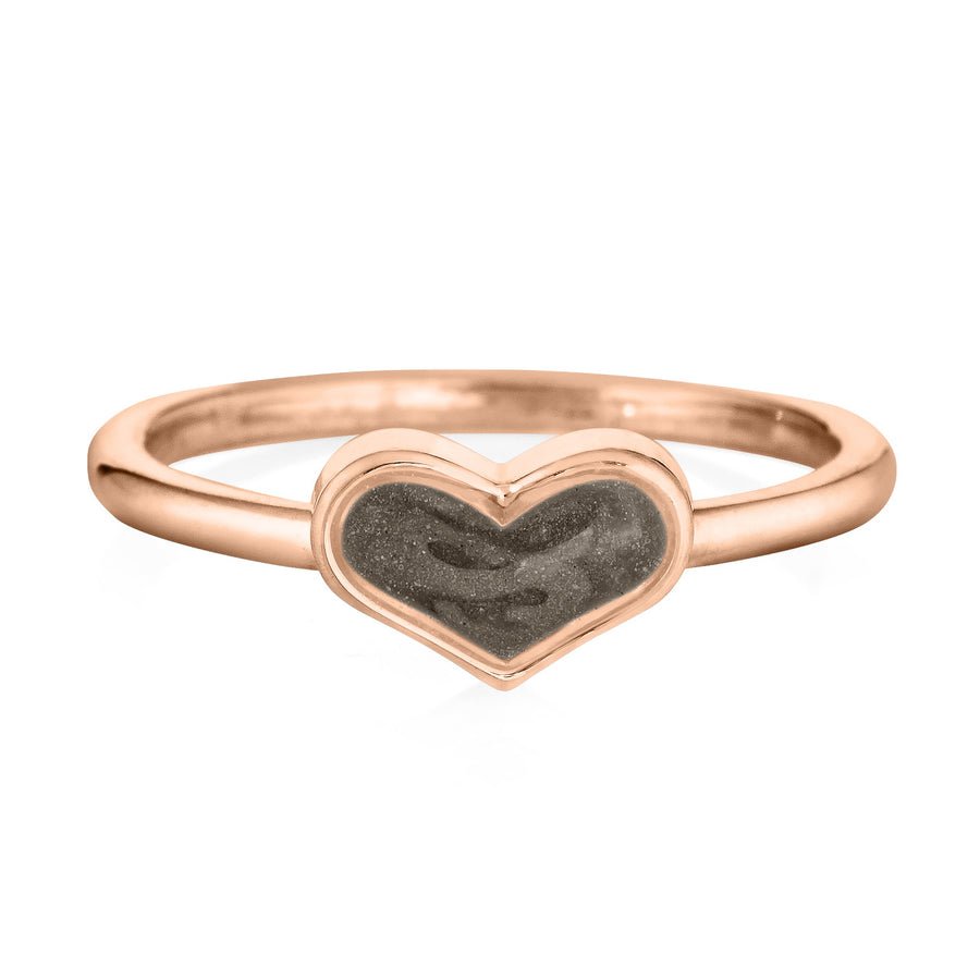 Pictured here is the 14K Rose Gold Small Heart Stacking Ring with ashes designed by close by me jewelry from the front