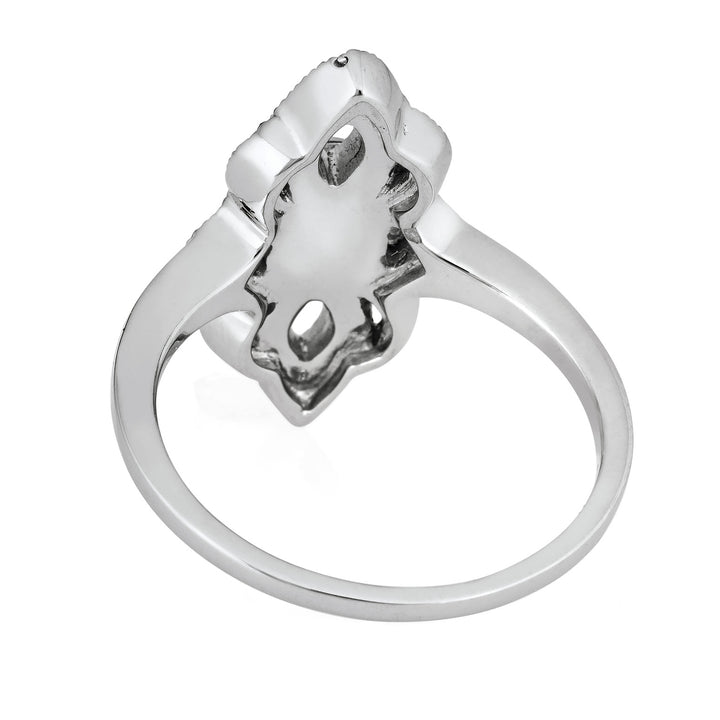 Pictured here is a close-up back view of Close By Me Jewelry's vintage-style World War II Cremation Ring in 14K White Gold set against a solid white background. This version of the ring features a smaller oval bezel (not shown) containing solidified cremated remains.