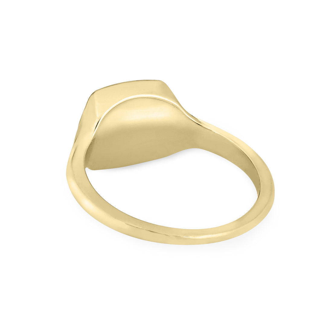 Close By Me's Anchor Signet Cremation Ring in 14K Yellow Gold floats in the center of a solid white background, facing away so that the back of the setting and band of the ring are visible.