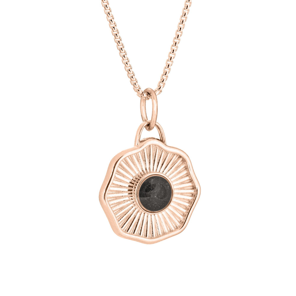Side of Scalloped Coin "Aurea" Cremation Pendant in 14K Rose Gold on a chain against a white background.