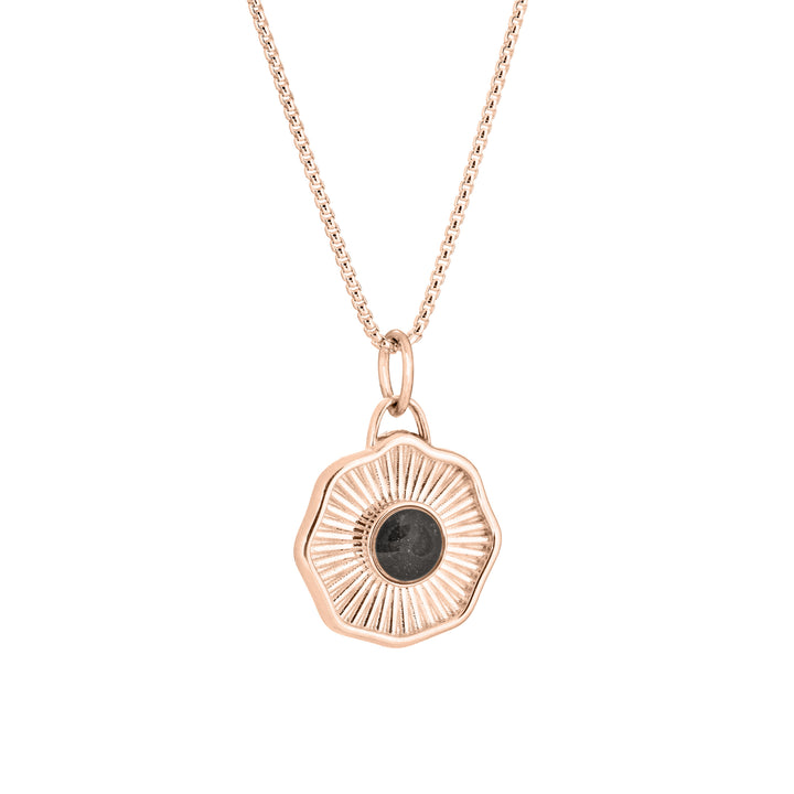 Side of Scalloped Coin "Aurea" Cremation Pendant in 14K Rose Gold on a chain against a white background.