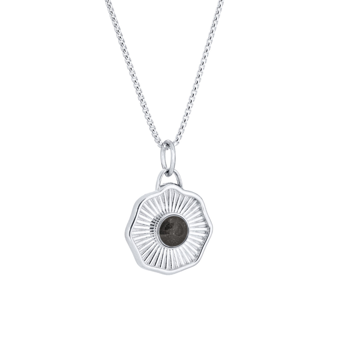 Side of Scalloped Coin "Aurea" Cremation Pendant in 14K White Gold on a chain against a white background.