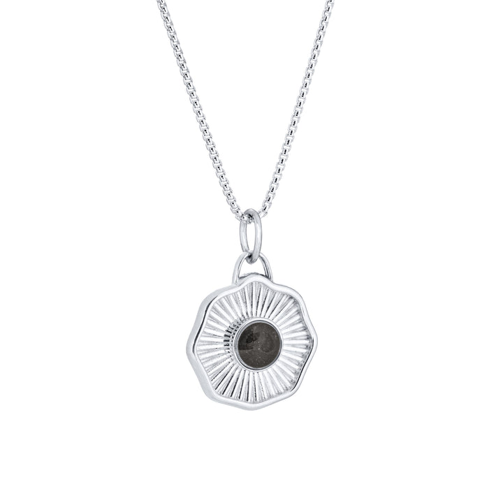 Side of Scalloped Coin "Aurea" Cremation Pendant in 14K White Gold on a chain against a white background.