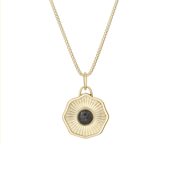 Front of Scalloped Coin "Aurea" Cremation Pendant in 14K Yellow Gold on a chain against a white background.