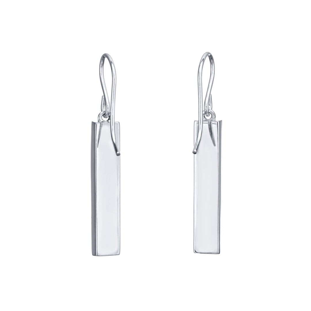 a pair of bar dangle memorial ashes earrings in 14k white gold by close by me jewelry from the back against a white background