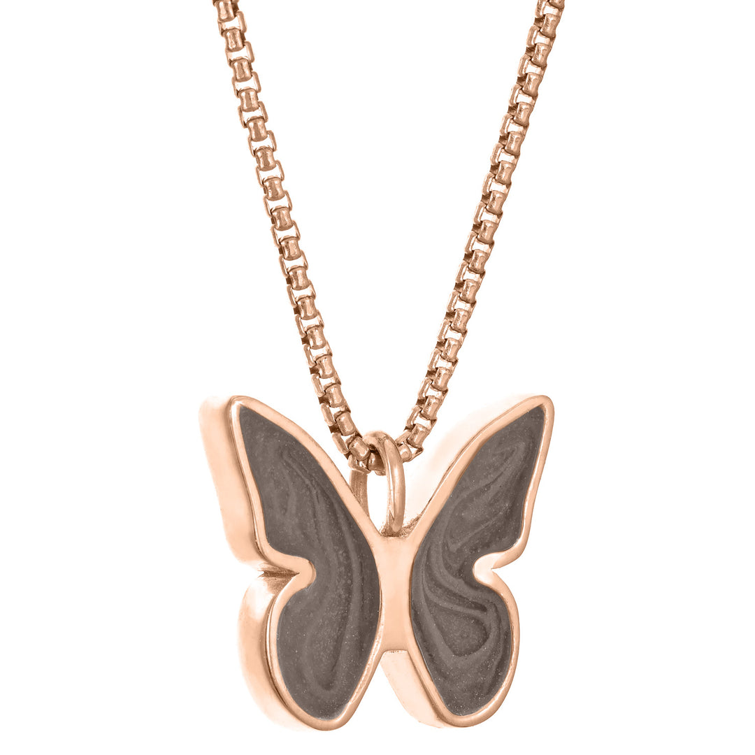 Pictured here is close by me jewelry's Butterfly Ashes Pendant in 14K Rose Gold from the side