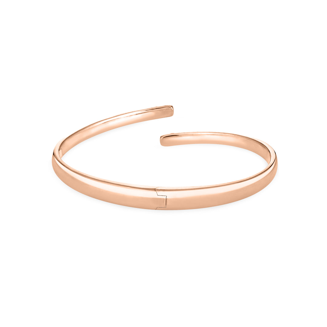 Back view of Close By Me's 14K Rose Gold Bypass Hinged Cuff Cremation Bracelet, centered in a solid white square.