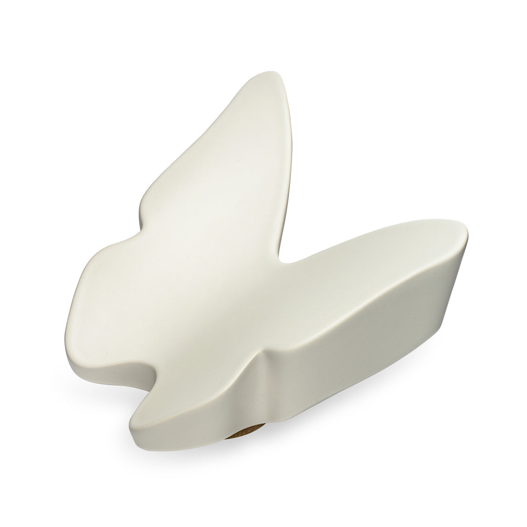 Right side view of Close By Me's Ceramic Butterfly Urn against a white background.