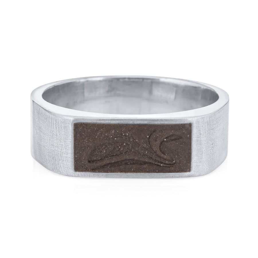 Pictured here is close by me jewelry's Men's Classic Band Cremation Ring design in 14K White Gold from the front to show its dark grey ashes setting