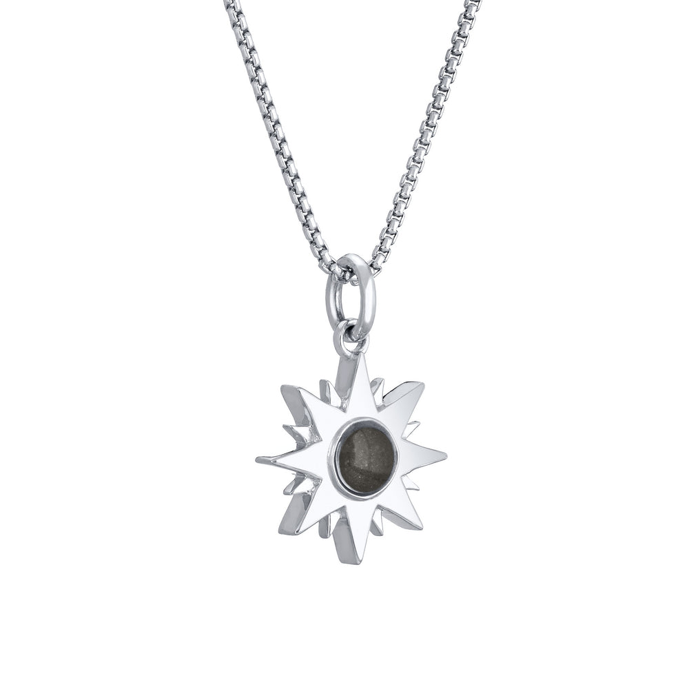 Side of Dainty Sun Cremation Pendant in 14K White Gold on a chain against a white background.