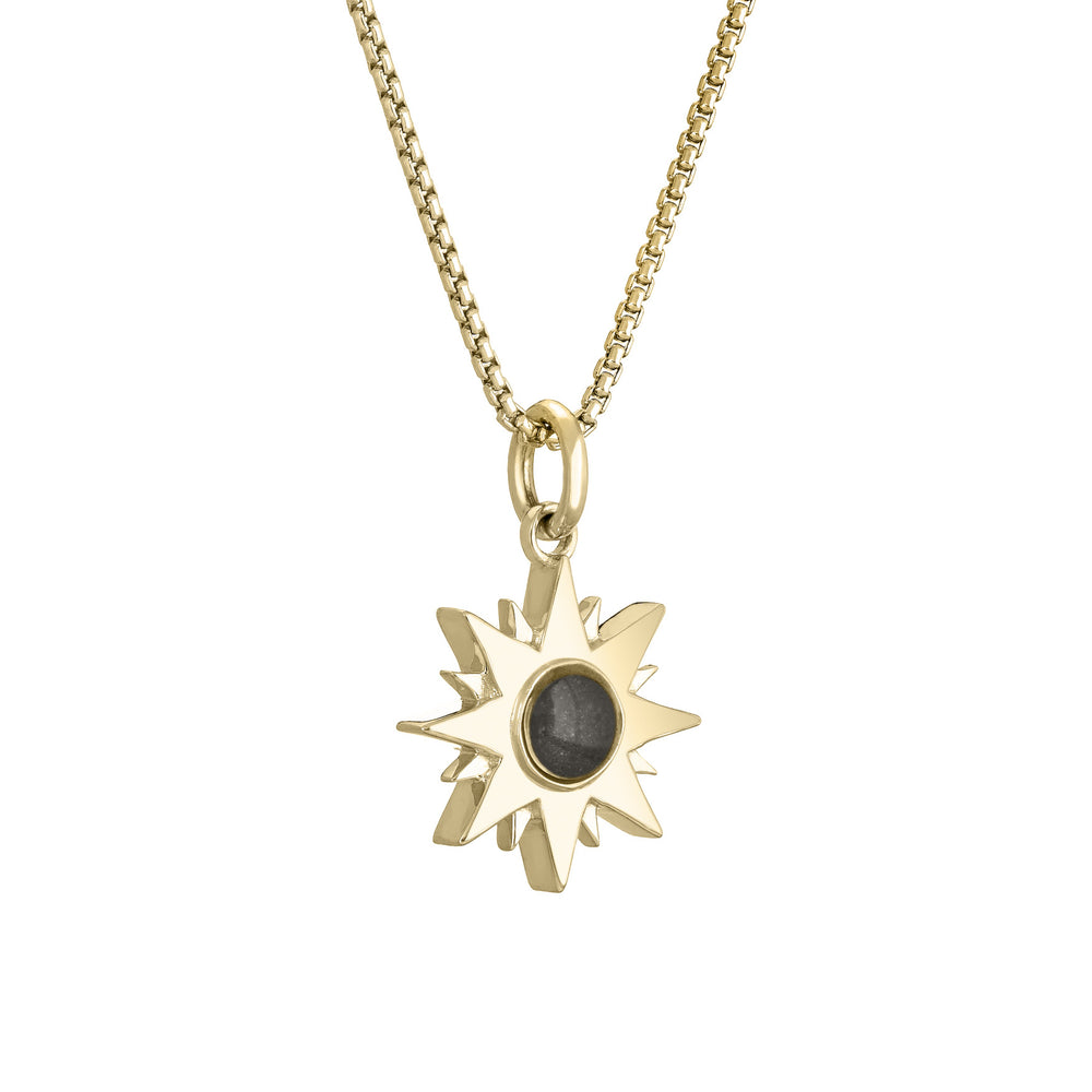 Side of Dainty Sun Cremation Pendant in 14K Yellow Gold on a chain against a white background.
