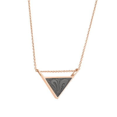 The 14k rose gold detailed sliding triangle ashes pendant by close by me jewelry from the side
