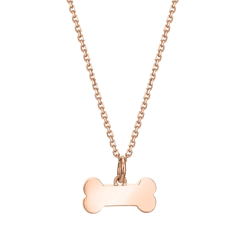 Pictured here is the Dog Bone Pendant with ashes in 14K Rose Gold, designed by close by me jewelry, from the back