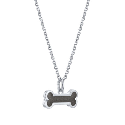 Pictured here is the Dog Bone Memorial Pendant with ashes in 14K White Gold, designed by close by me jewelry, from the side