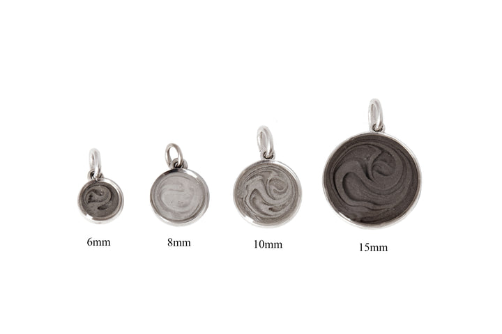 Close By Me's 6mm, 8mm, 10mm, and 15mm Dome Pendants pictured next to each other from smallest to largest with their respective sizes written in text underneath.