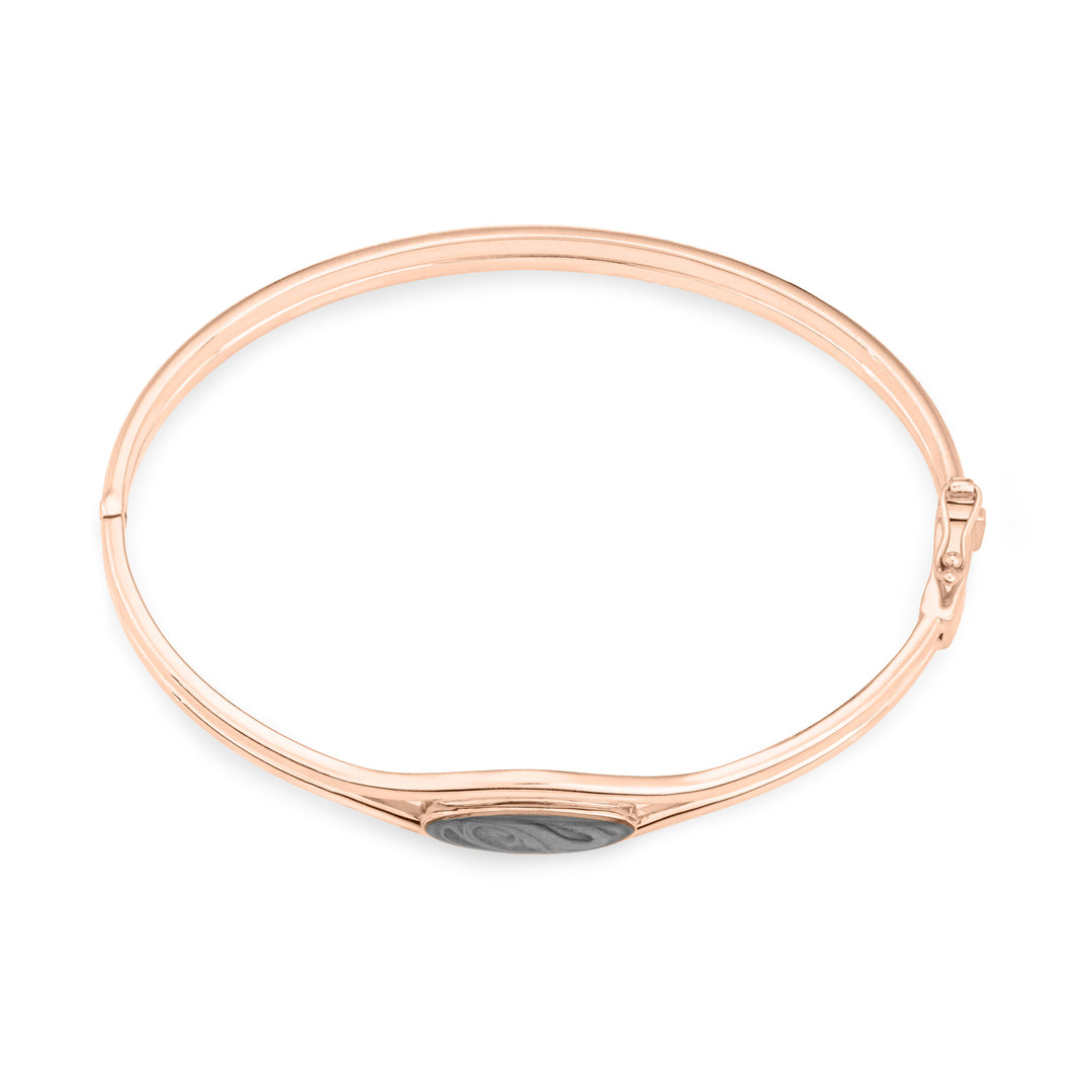 Overhead view of Double Band Oval Bangle Cremation Bracelet in 14K Rose Gold against a white background.