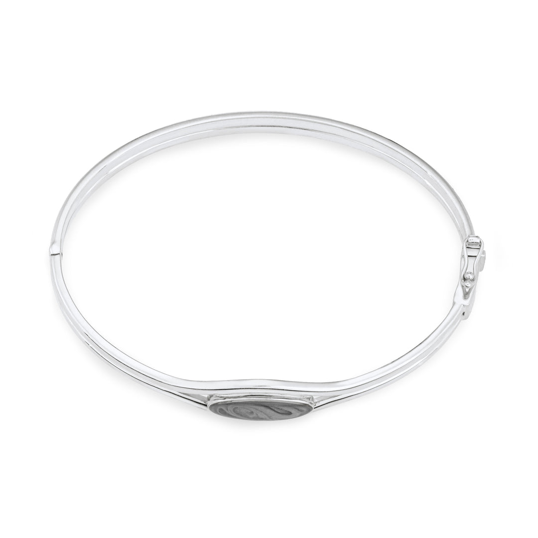 Overhead view of Double Band Oval Bangle Cremation Bracelet in Rhodium-Plated Sterling Silver against a white background.