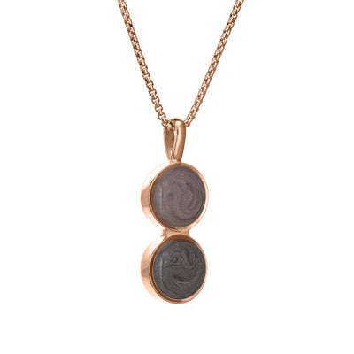 This photo shows close by me jewelry's Double Circle Memorial Pendant design in 14K Rose Gold from the side