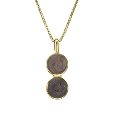 This photo shows close by me jewelry's Double Circle Cremation Necklace design in 14K Yellow Gold from the front