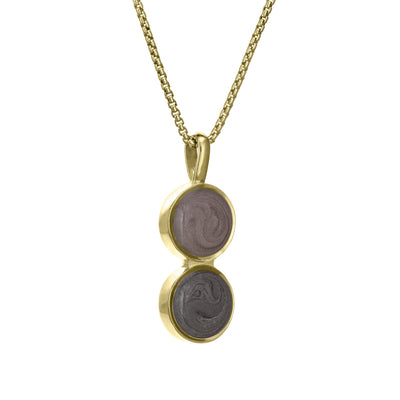 This photo shows close by me jewelry's Double Circle Cremation Necklace design in 14K Yellow Gold from the side