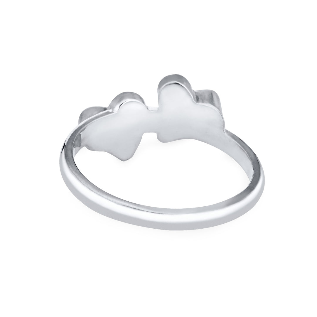Back view of Close By Me's 14K White Gold Double Heart Cremation Ring, floating against a white backdrop.